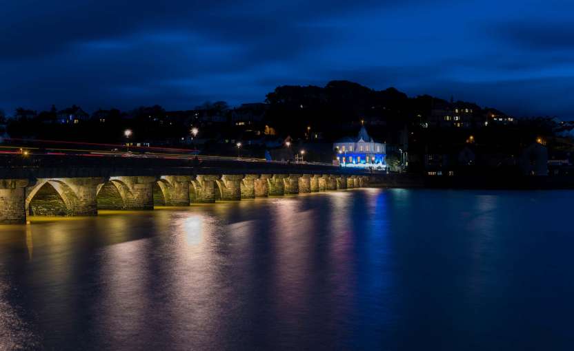 Royal Hotel Christmas Exterior Over Bideford Bridge at Night