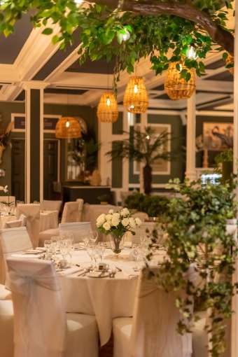 table laid up for a wedding in Palm Court 
