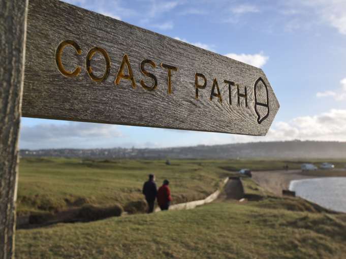 Coast path sign at Northam Burrows