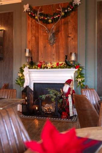 Merchants Bistro Fireplace decorated for Christmas 
