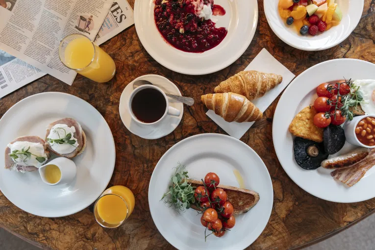A top down view of a selection of breakfast dishes available at The Royal Hotel Bideford