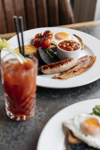 A close up of two cooked breakfasts on a table in The Royal Hotel Bidefor