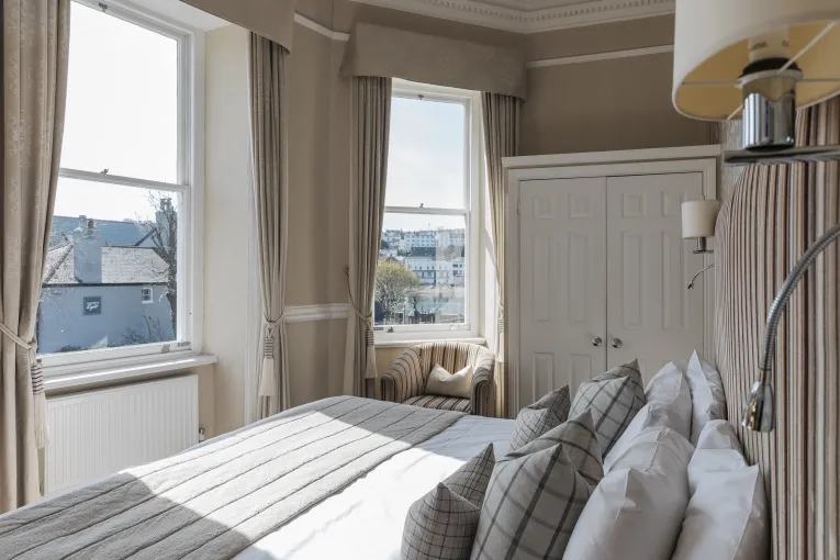 A double bedroom at The Royal Hotel Bideford with views out over the town