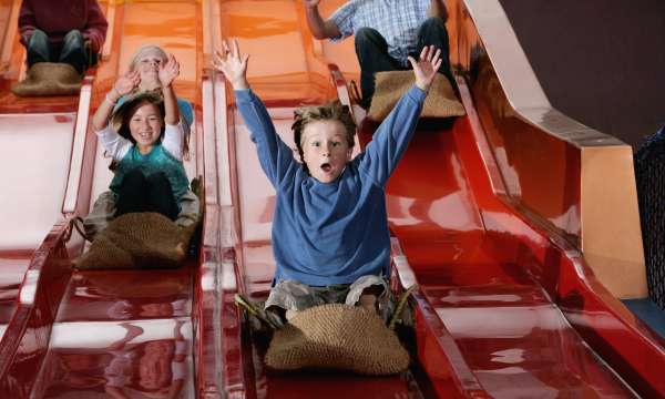 children on slides at Milky Way