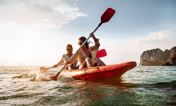 Couple in an orange kayak