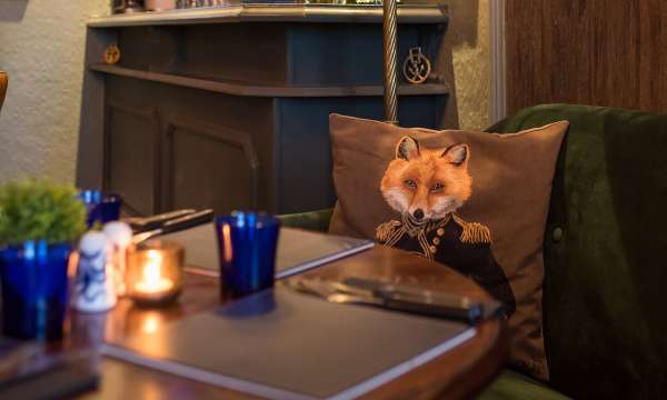 Fox cushion detail at Merchants Bistro