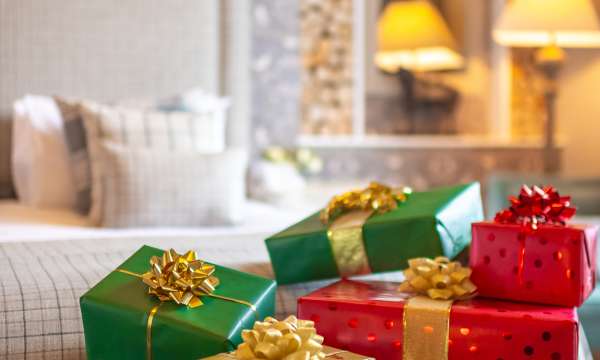 Portrait image of presents on bed 