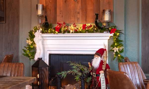 Merchants Bistro Fireplace decorated for Christmas 