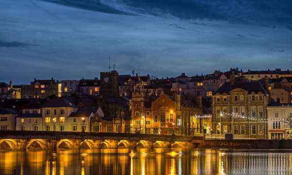 Bideford old bridge lit up at night