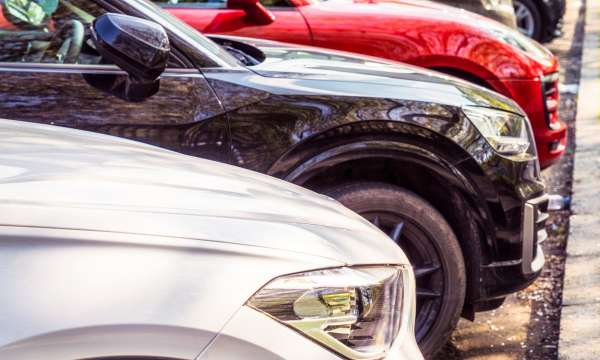 Close up of parked cars in a private car park