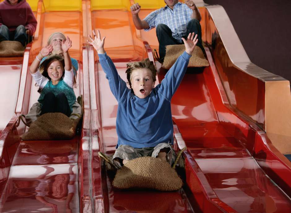 children on slides at Milky Way