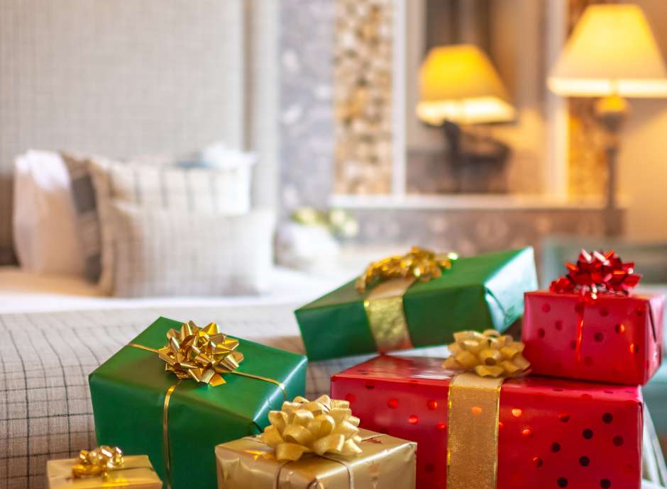 Portrait image of presents on bed 