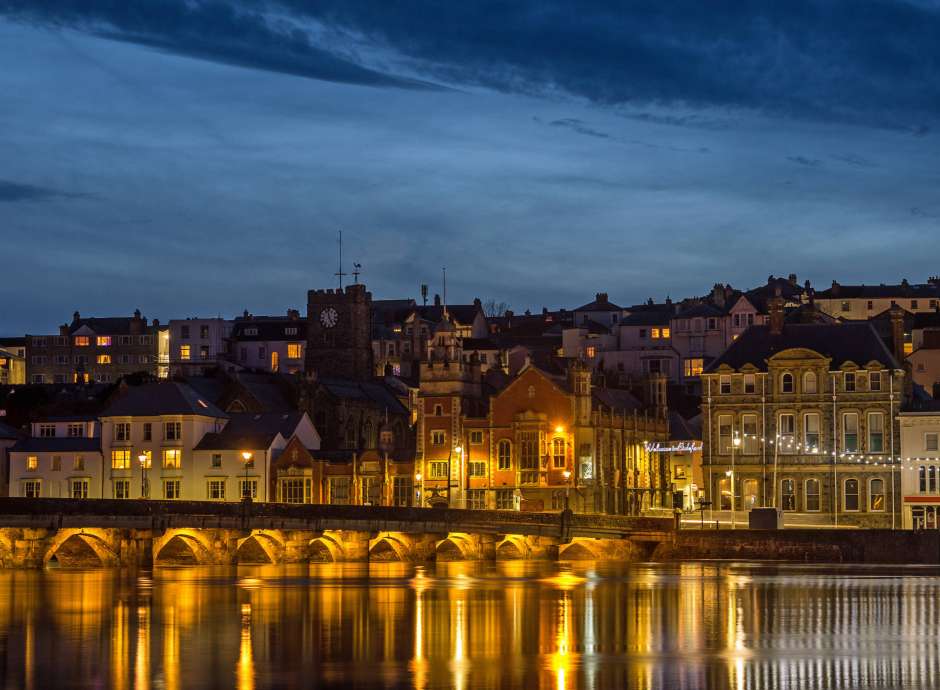 Bideford old bridge lit up at night