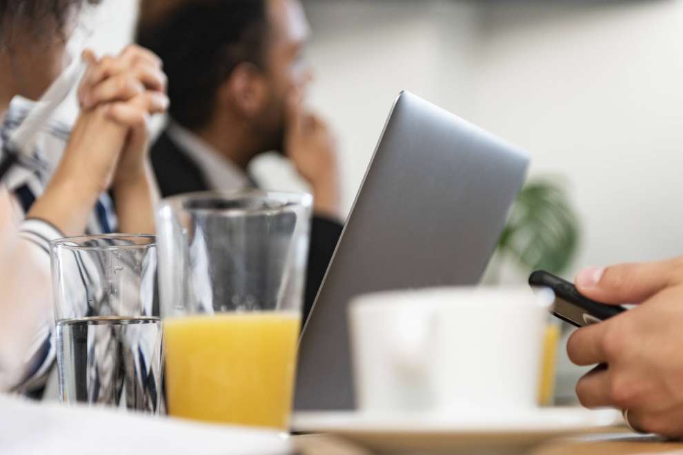 Business people gathered in a meeting room 
