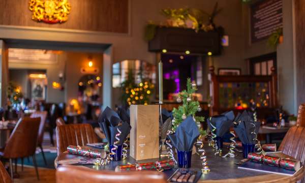 Table in Merchants Bistro decorated for Christmas 